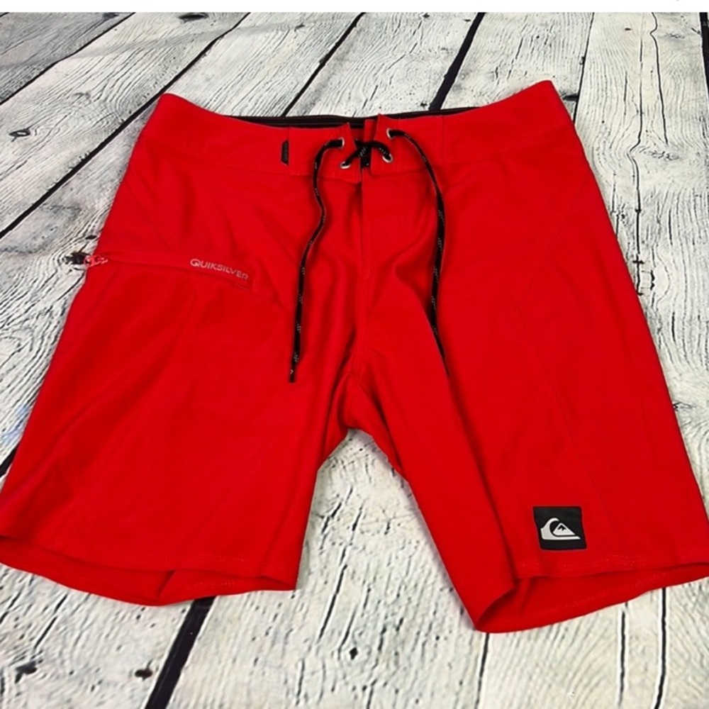 Red quiksilver board shorts